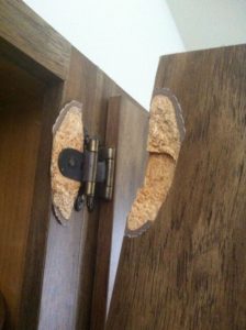 broken particle board from a cheap gun cabinet type model